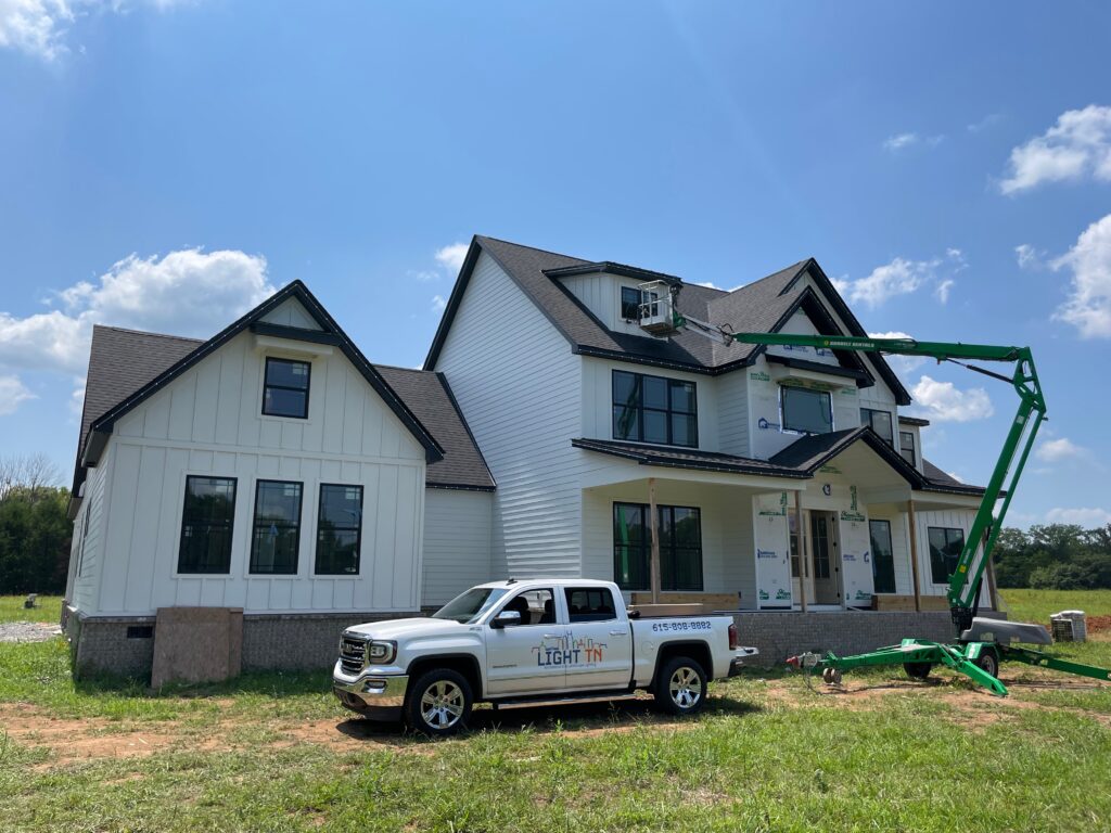 Light TN installing permanent roofline lighting